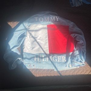 A cute jean jacket with an authentic Timmy Hilfiger design